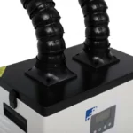 Zbliżenie na górną część urządzenia z podwójnym gniazdem rur